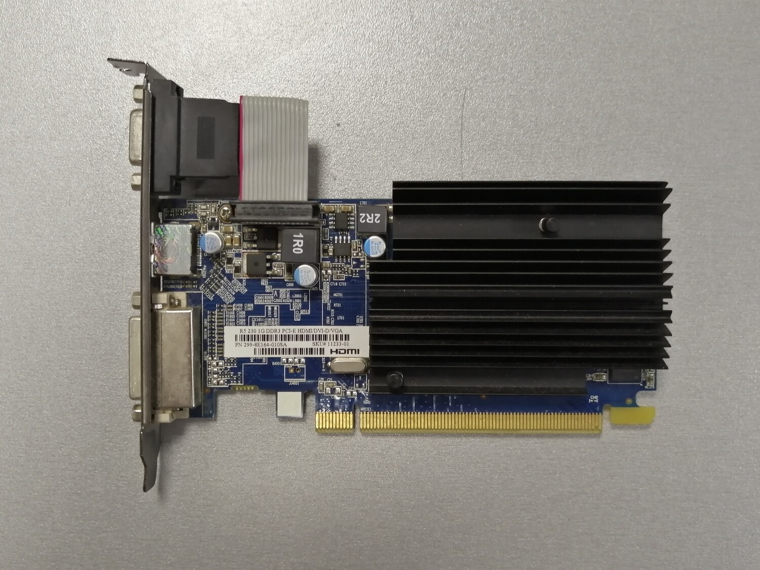 Видеокарта Sapphire Radeon R5 230 625MHz PCI-E 2.1 1024MB 1334MHz 64 bit DVI HDMI HDCP Видеокарта Sapphire Radeon R5 230 625MHz PCI-E 2.1 1024MB 1334MHz 64 bit DVI HDMI HDCP